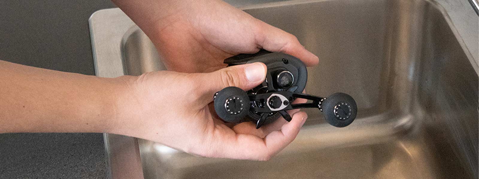 magnetische knop en slipknop vastzetten reel onderhoud